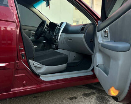 Красный Киа Черато, объемом двигателя 1.6 л и пробегом 212 тыс. км за 4500 $, фото 21 на Automoto.ua