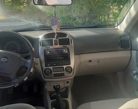 Красный Киа Черато, объемом двигателя 2 л и пробегом 144 тыс. км за 5400 $, фото 5 на Automoto.ua