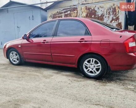 Красный Киа Черато, объемом двигателя 2 л и пробегом 233 тыс. км за 4700 $, фото 4 на Automoto.ua