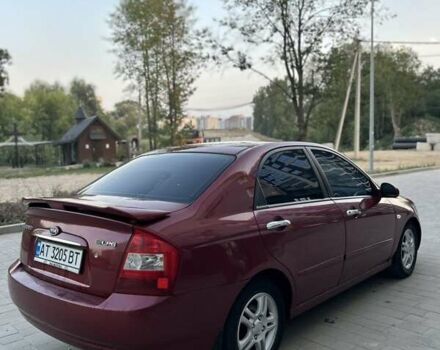 Красный Киа Черато, объемом двигателя 1.98 л и пробегом 233 тыс. км за 4450 $, фото 13 на Automoto.ua