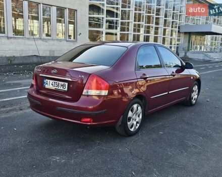 Красный Киа Черато, объемом двигателя 1.6 л и пробегом 200 тыс. км за 2600 $, фото 4 на Automoto.ua