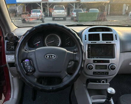 Красный Киа Черато, объемом двигателя 1.6 л и пробегом 212 тыс. км за 4500 $, фото 27 на Automoto.ua