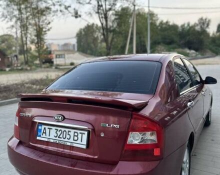 Красный Киа Черато, объемом двигателя 1.98 л и пробегом 233 тыс. км за 4450 $, фото 12 на Automoto.ua