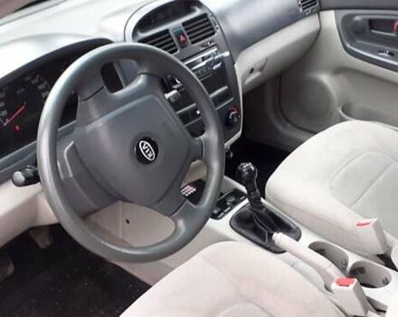 Красный Киа Черато, объемом двигателя 1.6 л и пробегом 229 тыс. км за 4500 $, фото 3 на Automoto.ua