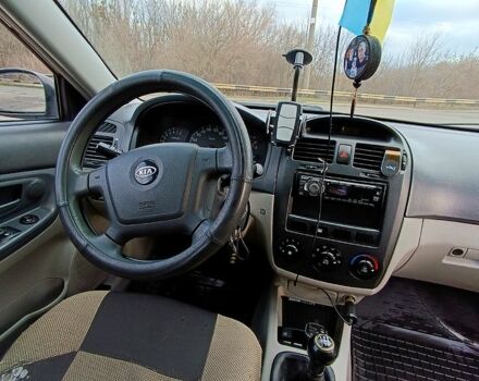 Красный Киа Черато, объемом двигателя 1.6 л и пробегом 233 тыс. км за 4200 $, фото 4 на Automoto.ua