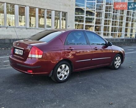 Красный Киа Черато, объемом двигателя 1.6 л и пробегом 200 тыс. км за 2600 $, фото 5 на Automoto.ua