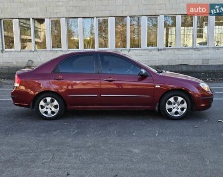 Красный Киа Черато, объемом двигателя 1.6 л и пробегом 200 тыс. км за 2600 $, фото 3 на Automoto.ua