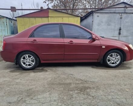 Красный Киа Черато, объемом двигателя 2 л и пробегом 233 тыс. км за 4700 $, фото 5 на Automoto.ua