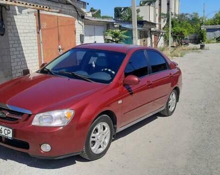 Красный Киа Черато, объемом двигателя 2 л и пробегом 144 тыс. км за 5400 $, фото 9 на Automoto.ua