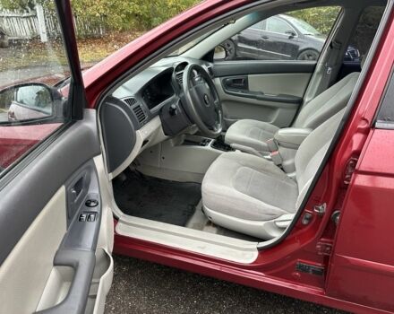 Красный Киа Черато, объемом двигателя 1.6 л и пробегом 228 тыс. км за 3850 $, фото 7 на Automoto.ua