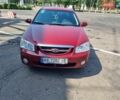 Красный Киа Черато, объемом двигателя 1.6 л и пробегом 212 тыс. км за 5500 $, фото 37 на Automoto.ua
