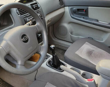 Красный Киа Черато, объемом двигателя 1.6 л и пробегом 175 тыс. км за 3350 $, фото 7 на Automoto.ua