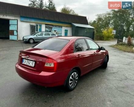 Красный Киа Черато, объемом двигателя 1.6 л и пробегом 229 тыс. км за 4500 $, фото 15 на Automoto.ua