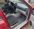 Красный Киа Черато, объемом двигателя 2 л и пробегом 233 тыс. км за 4700 $, фото 7 на Automoto.ua