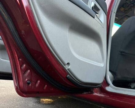 Красный Киа Черато, объемом двигателя 1.6 л и пробегом 212 тыс. км за 4500 $, фото 9 на Automoto.ua