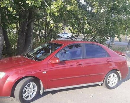 Красный Киа Черато, объемом двигателя 2 л и пробегом 144 тыс. км за 5400 $, фото 7 на Automoto.ua