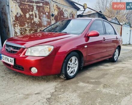 Красный Киа Черато, объемом двигателя 2 л и пробегом 233 тыс. км за 4700 $, фото 2 на Automoto.ua