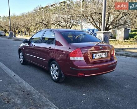 Красный Киа Черато, объемом двигателя 1.6 л и пробегом 200 тыс. км за 2600 $, фото 6 на Automoto.ua