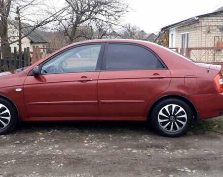 Красный Киа Черато, объемом двигателя 1.6 л и пробегом 229 тыс. км за 4500 $, фото 7 на Automoto.ua