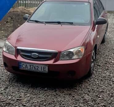 Красный Киа Черато, объемом двигателя 1.6 л и пробегом 229 тыс. км за 4500 $, фото 9 на Automoto.ua