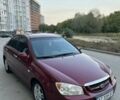 Красный Киа Черато, объемом двигателя 1.98 л и пробегом 233 тыс. км за 4450 $, фото 4 на Automoto.ua