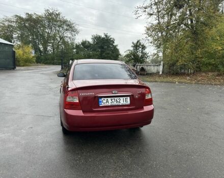 Красный Киа Черато, объемом двигателя 1.6 л и пробегом 228 тыс. км за 3850 $, фото 1 на Automoto.ua