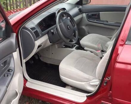 Красный Киа Черато, объемом двигателя 1.6 л и пробегом 229 тыс. км за 4500 $, фото 2 на Automoto.ua