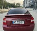 Красный Киа Черато, объемом двигателя 1.98 л и пробегом 233 тыс. км за 4450 $, фото 2 на Automoto.ua