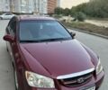 Красный Киа Черато, объемом двигателя 1.98 л и пробегом 233 тыс. км за 4450 $, фото 5 на Automoto.ua