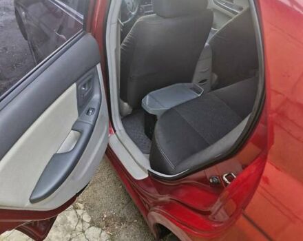 Красный Киа Черато, объемом двигателя 2 л и пробегом 233 тыс. км за 4700 $, фото 23 на Automoto.ua