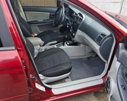 Красный Киа Черато, объемом двигателя 2 л и пробегом 233 тыс. км за 4700 $, фото 14 на Automoto.ua