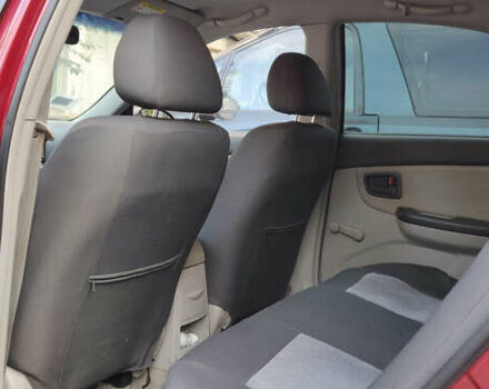 Красный Киа Черато, объемом двигателя 1.6 л и пробегом 175 тыс. км за 3350 $, фото 9 на Automoto.ua