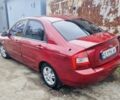 Красный Киа Черато, объемом двигателя 2 л и пробегом 233 тыс. км за 4700 $, фото 3 на Automoto.ua