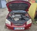 Красный Киа Черато, объемом двигателя 2 л и пробегом 233 тыс. км за 4700 $, фото 15 на Automoto.ua