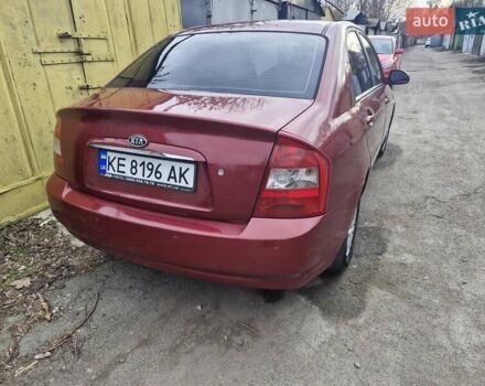 Красный Киа Черато, объемом двигателя 2 л и пробегом 233 тыс. км за 4700 $, фото 29 на Automoto.ua