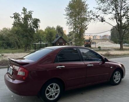 Красный Киа Черато, объемом двигателя 1.98 л и пробегом 233 тыс. км за 4450 $, фото 10 на Automoto.ua