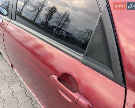 Красный Киа Черато, объемом двигателя 1.59 л и пробегом 240 тыс. км за 3750 $, фото 4 на Automoto.ua