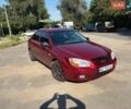 Красный Киа Черато, объемом двигателя 1.59 л и пробегом 204 тыс. км за 4000 $, фото 1 на Automoto.ua