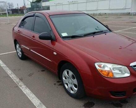 Червоний Кіа Черато, об'ємом двигуна 1.6 л та пробігом 118 тис. км за 5599 $, фото 1 на Automoto.ua