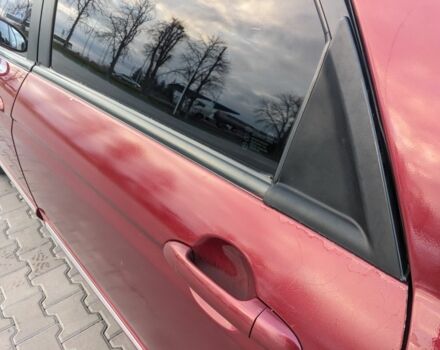 Красный Киа Черато, объемом двигателя 1.6 л и пробегом 240 тыс. км за 3750 $, фото 7 на Automoto.ua