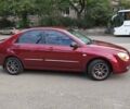 Красный Киа Черато, объемом двигателя 1.59 л и пробегом 203 тыс. км за 5800 $, фото 3 на Automoto.ua