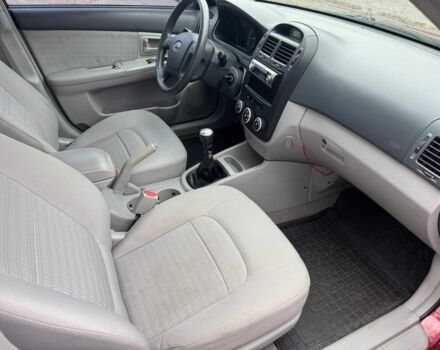 Красный Киа Черато, объемом двигателя 1.6 л и пробегом 197 тыс. км за 4150 $, фото 7 на Automoto.ua