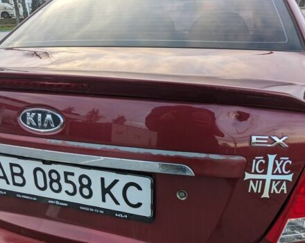 Красный Киа Черато, объемом двигателя 1.6 л и пробегом 240 тыс. км за 3750 $, фото 5 на Automoto.ua