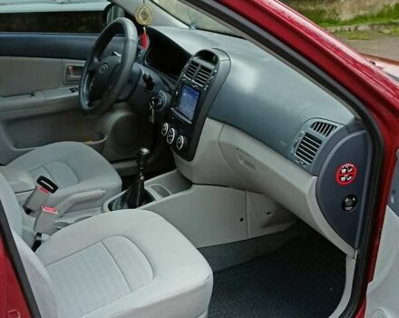 Червоний Кіа Черато, об'ємом двигуна 1.6 л та пробігом 118 тис. км за 5599 $, фото 12 на Automoto.ua