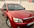 Красный Киа Черато, объемом двигателя 1.6 л и пробегом 245 тыс. км за 3400 $, фото 1 на Automoto.ua