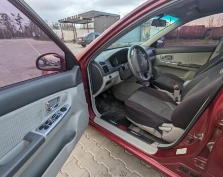 Красный Киа Черато, объемом двигателя 1.6 л и пробегом 240 тыс. км за 3750 $, фото 11 на Automoto.ua