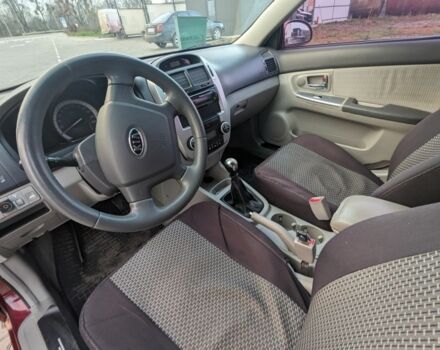 Красный Киа Черато, объемом двигателя 1.6 л и пробегом 240 тыс. км за 3750 $, фото 10 на Automoto.ua