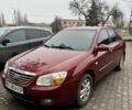 Красный Киа Черато, объемом двигателя 1.6 л и пробегом 232 тыс. км за 3600 $, фото 1 на Automoto.ua