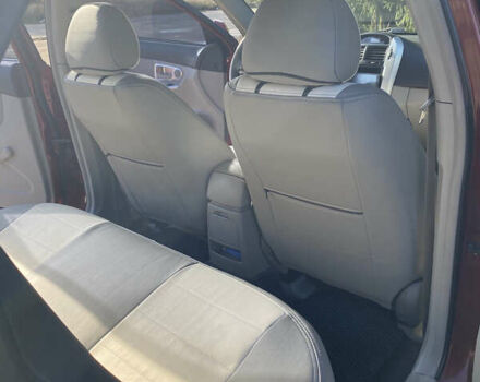 Червоний Кіа Черато, об'ємом двигуна 1.6 л та пробігом 239 тис. км за 4900 $, фото 5 на Automoto.ua