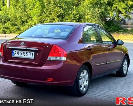 Красный Киа Черато, объемом двигателя 1.6 л и пробегом 250 тыс. км за 3500 $, фото 2 на Automoto.ua
